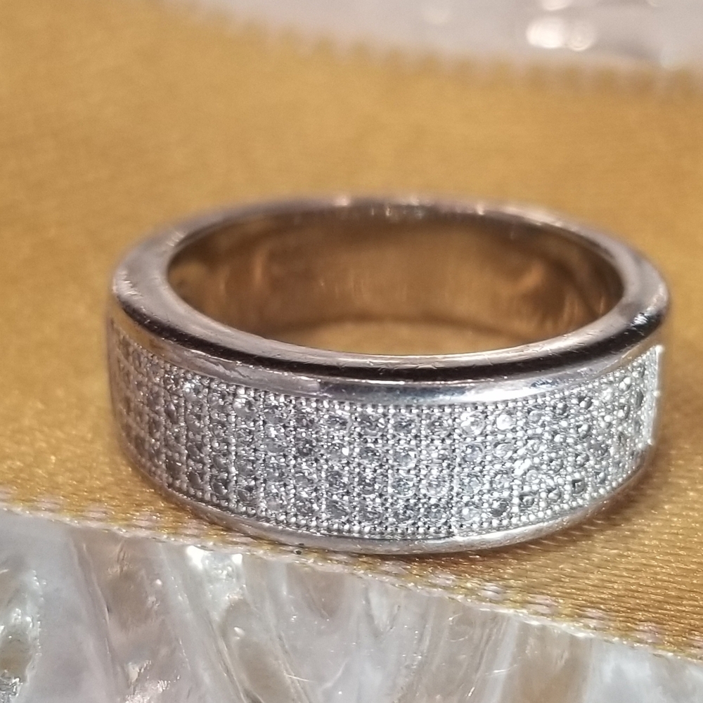 Sterling Silver Band Ring Inlaid With Cubic Zirconia Made By "AMG". Size 8.